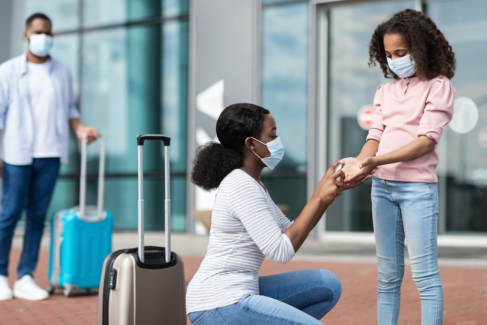 Family Traveling with kid using Sanitizer during COVID-19 Outbreak - Health Tips