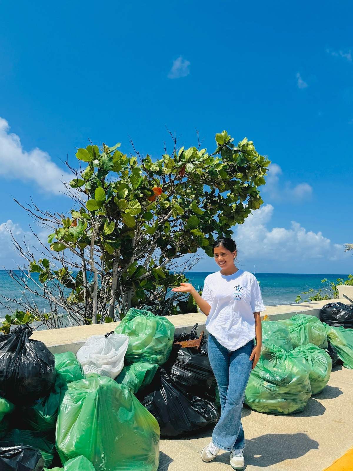 Earth Day Action: Complete Clean Cayman Staff During Beach Cleanup At East End 2025
